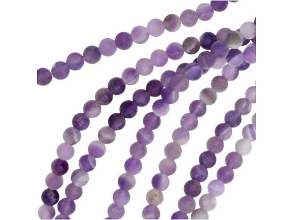 Put pops of purple into your style. These Dakota Stones dog teeth amethyst beads feature purple and white colors full of elegance. They are small beads and round in size, so you can use them as accents of color in necklaces, bracelets, and earrings. Dog teeth amethyst is a combination of amethyst and white quartz mixed together in a striped, chevron pattern. It is named for its resemblance to the dog tooth violet. This stone is also known as chevron amethyst. Metaphysical Properties: Dog teeth amethyst is said to help remove resistance to change and to dissipate and repel negativity of all kinds. Because gemstones are natural materials, appearances may vary from bead to bead. Each strand includes approximately 52 beads. Our amethyst beads have nice, deep color, but may show natural inclusions. Dakota Stones Matte Dog Teeth Amethyst Round Bead Strand These beads are beautiful in person. So glad I bought them. Karen J, Serious Artbeader 