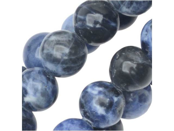 Midnight color comes alive in the Dakota Stones 8mm sodalite round beads. Available by the strand, these beads feature a perfectly round shape full of classic style that will work anywhere. They are the perfect size for using in matching necklace and bracelet sets. These beads feature dark blue color with hints of cloudy white and gray. Use these gemstone beads to add rich style to your designs.Because gemstones are natural materials, appearances may vary from piece to piece. Each strand includes approximately 24 beads.