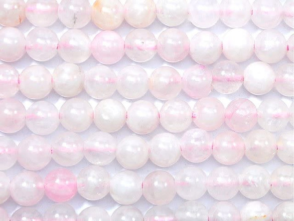 Add naturally sweet color to your designs with the Dakota Stones 10mm rose quartz large-hole round beads. Available by the strand, these gemstone beads will amaze and delight with their innovative design. Each bead features a wide stringing hole, perfect for using with thicker stringing materials like leather cord. They feature a perfectly round shape and a bold size that will stand out in any look. Each bead features a cloudy pale pink color. Metaphysical Properties: Rose quartz is known as the "love stone" and is used for its healing, calming, joyous and warm qualities. As with other types of quartz, it is believed to amplify energy and is commonly used in calming meditation and jewelry-making to stimulate romance and sensuality.Because gemstones are natural materials, appearances may vary from piece to piece. Each strand includes approximately 20 beads.Diameter 10mm, Hole Size 2.5mm/14 gauge