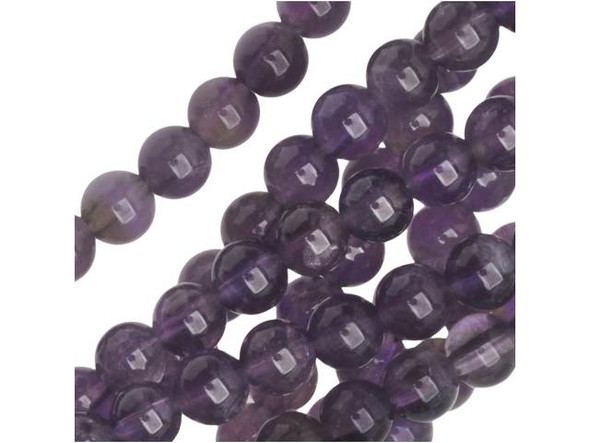 Let your style shine with natural accents using the Dakota Stones amethyst 4mm round beads. Available by the strand, these small beads are perfectly round and feature a deep purple coloring streaked with hints of cloudy white. These beads would make excellent spacers in between larger beads. Amethyst is the official birthstone of February. It forms in silica-rich liquids deposited in geodes and is generally found in clusters of crystal points. Metaphysical Properties: This stone's name is derived from the Greek word amethystos, meaning "not drunken." People of ancient times believed it to protect the wearer from drunkenness. Today, this gemstone is believed to promote happiness.Because gemstones are natural materials, appearances may vary from piece to piece. Each strand includes approximately 52 beads. Our amethyst beads have nice, deep color, but may show natural inclusions.