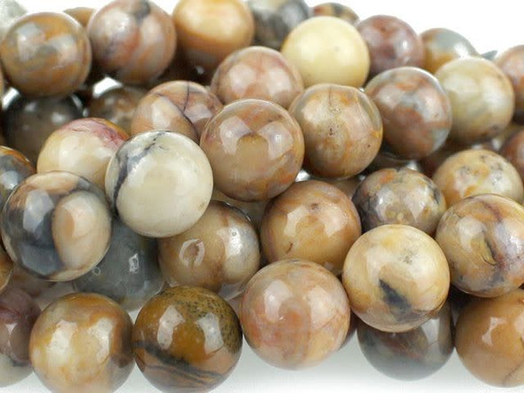 Let mellow colors fill your designs using the Dakota Stones 8mm Venus Jasper round beads. These beads are perfectly round in shape, so you can use them with any style. They are the perfect size for matching necklace and bracelet sets. Use them anywhere in your jewelry. These gemstone beads feature warm, earthy tones like beige, peach, brown and gray. They are sure to add soothing style to your designs. Venus Jasper takes its name from the planet Venus, which was named for the Roman goddess of love and beauty. It is also referred to as orbicular rhyolite. Metaphysical Properties: Jasper is a stone used from grounding, stability, strength and healing.Because gemstones are natural materials, appearances may vary from piece to piece. Each strand includes approximately 24 beads.