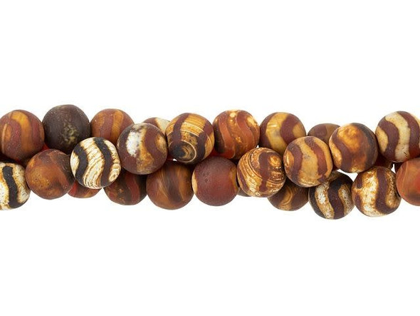 Showcase style with ancient meaning using these Dakota Stones beads. These beads are made to resemble beads first found in Ancient India. The full details of their use in ancient times are unknown, although they were often passed down as prized protective amulets. Authentic Dzi are usually scarred or pitted in places where some of the stone was ground off for use in curative potions. These reproductions are modeled after traditional color, pattern, and finish for Dzi beads. Because gemstones are natural materials, appearances may vary from piece to piece. Each strand includes approximately 65 beads.