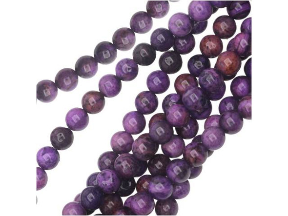 Like melting ice cream, these purple crazy lace agate 6mm round beads from Dakota Stones are swirling with color. These round beads will add rich color to your necklace and bracelet designs. The purple color is swirled with burgundy and black. They have a Mohs hardness of 6.5-7. Mexican crazy lace agate is normally an opaque white gemstone with swirling patterns, but these beads are color enhanced to emphasize these beautiful patterns. Color enhancing is common amongst agates to make them fashionably relevant. Metaphysical Properties: Often called the happy stone, crazy lace agate promotes laughter and optimism. Because gemstones are natural materials, appearances may vary from bead to bead. Each strand includes approximately 34 beads.