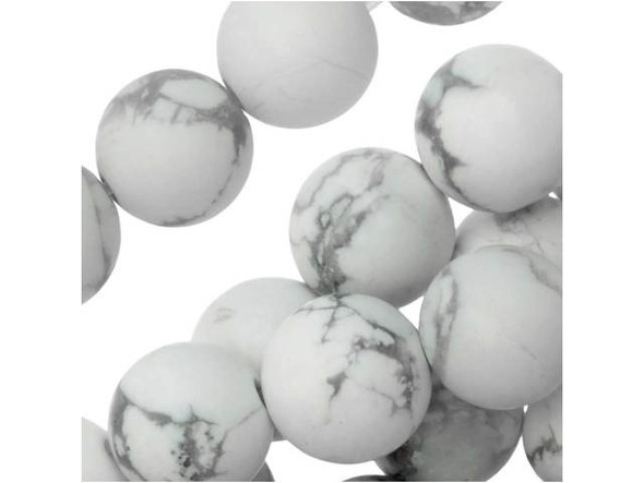 Stand out in your style with these Howlite beads from Dakota Stones. White Howlite is named for Canadian mineralogist Henry How, who first discovered the stone in Southern California in 1868. It is typically white or light gray with gray, black or brown veins running through it in web-like patterns. Because of its softness, Howlite can be easily dyed and is often treated to be blue for use as a substitute for turquoise. Because gemstones are natural materials, appearances may vary from bead to bead.