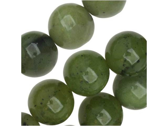 Add gorgeous green color to your designs with these Dakota Stones Canadian jade beads. These beads feature a jade green color dotted with small flecks of black. These beads are perfectly round and their size is perfect for bold necklaces or chunky bracelets. Use these beads with earth tones for a natural look. Jade is the industry name for this beautiful deep green stone. Ours is actually a serpentine, but it takes a trained eye and a microscope to discern the difference between this material and the jade it is named after. It is extremely tough, resistant to fracture and has been used to make choppers and blades since Neolithic times. Metaphysical Properties: This stone has been said to bring strength and longevity to the wearer. It also protects against failure and misfortune.Because gemstones are natural materials, appearances may vary from bead to bead. Each strand includes approximately 20 beads.