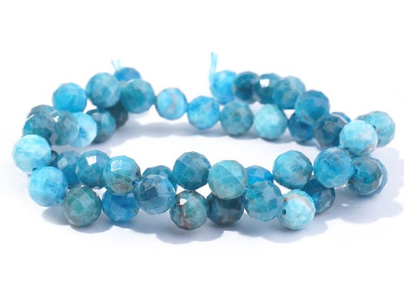 Gemstone style fills these beads from Dakota Stones. These blue apatite beads have a round shape with facets that catch the light. Blue apatite is a blue transparent phosphate material. It derives from the Greek word "apate," meaning to deceive, because it is often mistaken for other stones. The color of this material is such a vibrant blue that it is difficult to believe it could be found naturally. But this color is 100% natural. Mined in Brazil, Mexico, Myanmar, Africa and the USA, this stone has a Mohs hardness of 5. Metaphysical Properties: Often called a dual-action stone, blue apatite is used to achieve goals. It removes negativity, confusion and stimulates the mind to expand knowledge and truth. It is a great stone for encouraging inspiration and is famous for deepening meditation.Because gemstones are natural materials, appearances may vary from piece to piece.