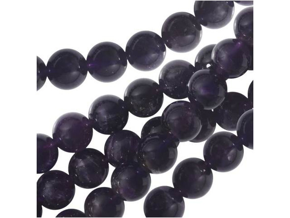 Create beautiful, high-quality designs with the Dakota Stones amethyst 10mm round beads. Available by the strand, these beads feature a spherical shape and a deep purple color streaked with hints of cloudy white. Amethyst is the official birthstone of February, making these beads perfect to use in gifts. These beads would look excellent in a bracelet and necklace set. Amethyst is the official birthstone of February. It forms in silica-rich liquids deposited in geodes and is generally found in clusters of crystal points. Metaphysical Properties: This stone's name is derived from the Greek word amethystos, meaning "not drunken." People of ancient times believed it to protect the wearer from drunkenness. Today, this gemstone is believed to promote happiness.Because gemstones are natural materials, appearances may vary from piece to piece. Each strand includes approximately 20 beads. Our amethyst beads have nice, deep color, but may show natural inclusions.