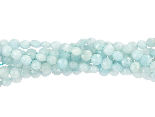 Make a splash in your style with these Dakota Stones aquamarine beads. These small gemstone beads feature a circular shape with a puffed edge and a checkerboard faceted face. The surface catches the light in a multitude of directions. The stringing hole is wide enough to use with 20 gauge wire. Use these small beads as accents of color and shine in all kinds of jewelry projects. They feature icy blue and white colors. Because gemstones are natural materials, appearances may vary from piece to piece. Each strand includes approximately 99 beads.