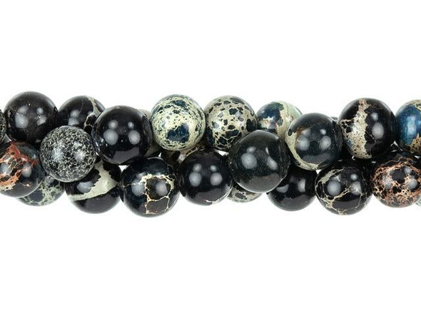 Be bold in your style with these Dakota Stones impression jasper beads. These gemstone beads are perfectly round in shape, so they will work in a variety of designs. They are versatile in size, too. Use them in necklaces, bracelets, and earrings. Impression jasper comes in a variety of colors. These beads have been dyed a black color, which creates a striking contrast with the tan and crimson matrix colors. Metaphysical properties: Impression Jasper is used to find clarity and inner peace. Because gemstones are natural materials, appearances may vary from piece to piece. Each strand includes approximately 66 beads.
