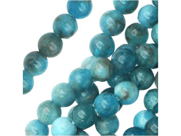 Capture the colors of the sea in your designs with the blue apatite 4mm round beads from Dakota Stones. Available by the strand, these small beads are perfectly round in shape and feature ocean colors ranging from deep blue to sea green. Use these beads as spacers in tropical, ocean-inspired looks. Blue apatite is a blue transparent phosphate material. It derives from the Greek word "apate," meaning to deceive, because it is often mistaken for other stones. The color of this material is such a vibrant blue that it is difficult to believe it could be found naturally. But this color is 100% natural. Mined in Brazil, Mexico, Myanmar, Africa and the USA, this stone has a Mohs hardness of 5. Metaphysical Properties: Often called a dual-action stone, blue apatite is used to achieve goals. It removes negativity, confusion and stimulates the mind to expand knowledge and truth. It is a great stone for encouraging inspiration and is famous for deepening meditation.Because gemstones are natural materials, appearances may vary from piece to piece. Each strand includes approximately 52 beads.