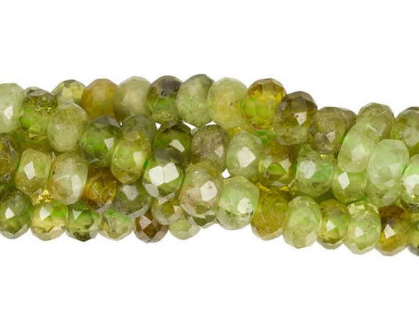 Bring a refreshing gleam to your looks with these gemstone beads from Dakota Stones. These small green garnet beads feature a classic rounded shape with facets cut into the surface for a glittering look. They are the perfect size for using as spacers, and would make wonderful pops of color in earrings, too. Garnets are a group of silicate minerals that have been used since the Bronze Age as gemstones and abrasives. Metaphysical Properties: Called the "Stone of Truth," green garnet is a symbol of glory, love and persistence.Because gemstones are natural materials, appearances may vary from piece to piece. Each strand includes approximately 135-178 beads.