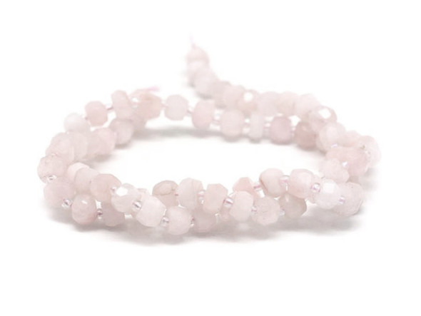 Decorate your jewelry designs with the gemstone style of these Dakota Stones beads. Kunzite was named after a former Tiffany &amp; Co. vice president, famed mineralogist and jeweler George Frederick Kunz, who first catalogued the stone in 1902. It is a variety of the silicate Spodumene, and forms naturally as a glassy, transparent stone. It can be colorless, pink, lilac, yellow or green, with darker shades being higher in value. Kunzite is prone to fading in direct sunlight. Because gemstones are natural materials, appearances may vary from bead to bead.