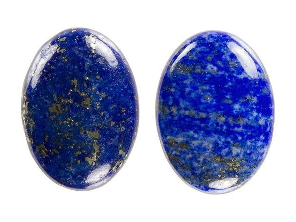 Put magical accents into your designs with the Dakota Stones 18x13mm lapis lazuli oval cabochon. This oval-shaped cabochon features a domed front that will stand out nicely in designs. The back is flat, so you can easily add it to projects. It is bold in size, so you can use it as a focal in a bracelet or pair it with bead embroidery. Lapis lazuli is a semi-precious stone that contains primarily lazurite, calcite and pyrite. It was among the first gemstones to be worn as jewelry and worked on. It features a deep blue color with shimmering flecks of gold. Metaphysical Properties: Lapis lazuli is said to enhance insight, intellect and awareness.Because gemstones are natural materials, appearances may vary from piece to piece.Length 18mm, Width 13mm
