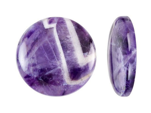 Bring beautiful purple color to designs with this cabochon from Dakota Stones. This cabochon is circular in shape and features a slightly domed front that will stand out in designs. The back of the cabochon is flat, for easy application. Use it in a bezel setting or in bead embroidery. Dog teeth amethyst is a combination of amethyst and white quartz mixed together in a striped, chevron pattern. It is named for its resemblance to the dog tooth violet. The stone is also known as chevron amethyst. Metaphysical Properties: Dog teeth amethyst is said to help remove resistance to change and to dissipate and repel negativity of all kinds.Because gemstones are natural materials, appearances may vary from piece to piece. Our amethyst beads have nice, deep color, but may show natural inclusions.Diameter 25mm, Total Height 5.5mm