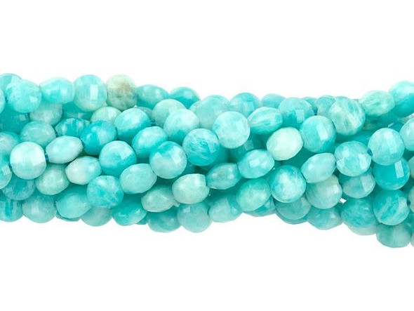 Add gleaming accents to designs with these Dakota Stones beads. These small gemstone beads feature a circular shape with a puffed edge and a diamond-cut faceted face. The surface catches the light in a multitude of directions. Use these small beads as accents of color and shine in all kinds of jewelry projects. Each bead features opaque ocean colors that range from blue-green to green. Amazonite is also known as Amazon stone. Metaphysical Properties: Amazonite is said to balance energy, while promoting harmony and universal love. It is often called the stone of courage and the stone of truth, as it provides the ability to discover truths and integrity.Because gemstones are natural materials, appearances may vary from piece to piece. Each strand includes approximately 100 beads.