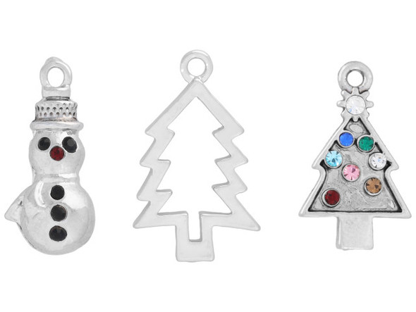 Decorate your designs with this assortment of holiday charms. This set of three charms comes with a snowman, a frame outline of a tree, and a Christmas tree decorated with small crystals. All of the charms feature loops on the top so they can easily be added to your designs. These charms feature a versatile silver shine. All charms have a hole size of about 2.0mm Charm Dimensions: Snowman 20 x 10mm, Frame Tree 23 x 14mm, Color Tree 20 x 12mm