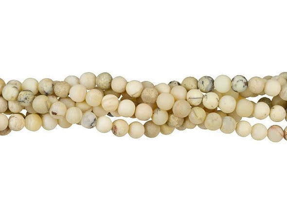 You'll love creating organic looks with these Dakota Stones white African opal beads. White African opal naturally occurs in shades of white, cream, and light tan. It is a variety of common opal. The internal structure of common opal does not result in the play of color associated with precious opal. These beads will give you a highly wearable and organic neutral color palette. These beads are small in size and round in shape, so you can use them as spacers. The matte finish adds a muted style.Because gemstones are natural materials, appearances may vary from piece to piece. Each strand includes approximately 52 beads. 