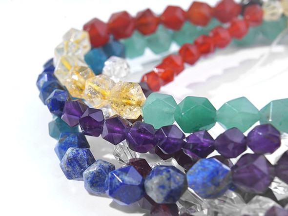 This Dakota Stones Chakra Stones 8mm Star Cut Round Bead Strand contains 8 different varieties of gemstones representing the different Chakras. The included gemstones are Amethyst, Lapis, Blue Apatite, Green Aventurine, Citrine, Carnelian, Red Garnet and Crystal Quartz.  The star cut gives these round beads triangular facets that catch the light and add extra shine to your designs. Each strand includes approximately 48 beads, with about 6 in each color. Size: 8mm Hole Size: 0.8mm