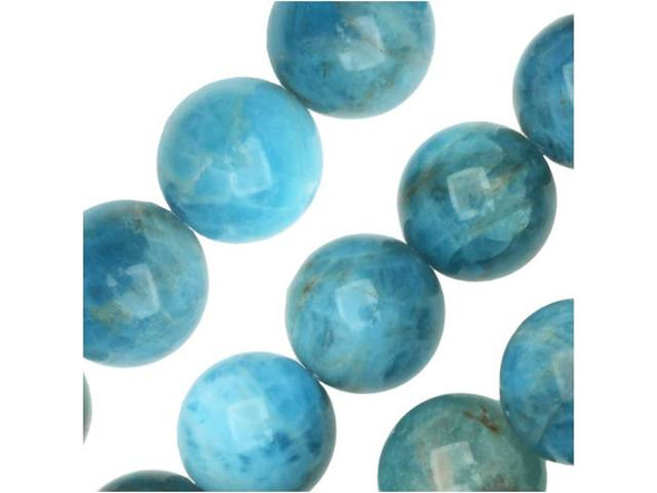 Give your designs an aquatic feel with the blue apatite 8mm round beads from Dakota Stones. Available by the strand, these round beads feature sea-worthy colors, including dark blue, ocean green and hints of foamy white. These beads are the perfect size for using in necklaces and bracelets. Blue apatite is a blue transparent phosphate material. It derives from the Greek word "apate," meaning to deceive, because it is often mistaken for other stones. The color of this material is such a vibrant blue that it is difficult to believe it could be found naturally. But this color is 100% natural. Mined in Brazil, Mexico, Myanmar, Africa and the USA, this stone has a Mohs hardness of 5. Metaphysical Properties: Often called a dual-action stone, blue apatite is used to achieve goals. It removes negativity, confusion and stimulates the mind to expand knowledge and truth. It is a great stone for encouraging inspiration and is famous for deepening meditation.Because gemstones are natural materials, appearances may vary from piece to piece. Each strand includes approximately 24 beads.