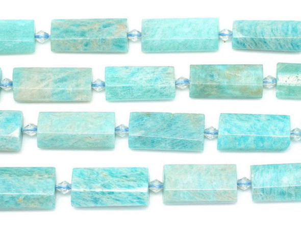 Decorate your jewelry designs with the gemstone style of these Dakota Stones beads. Brazilian Amazonite is an opaque blue to green to light green stone, often occurring with inclusions of white, yellow or gray and occasionally translucent milky white. It is named for the Amazon River in Brazil, where the stones are thought to have been originally found, however they are not currently sourced from that particular region. Amazonite has a long and illustrious history dating back to Mesopotamia. It was used in the Egyptian Book of the Dead, and an Amazonite ring was found among the treasures in King Tutankhamun's tomb. Because gemstones are natural materials, appearances may vary from bead to bead.
