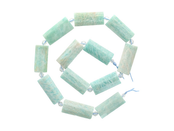 Decorate your jewelry designs with the gemstone style of these Dakota Stones beads. Brazilian Amazonite is an opaque blue to green to light green stone, often occurring with inclusions of white, yellow or gray and occasionally translucent milky white. It is named for the Amazon River in Brazil, where the stones are thought to have been originally found, however they are not currently sourced from that particular region. Amazonite has a long and illustrious history dating back to Mesopotamia. It was used in the Egyptian Book of the Dead, and an Amazonite ring was found among the treasures in King Tutankhamun's tomb. Because gemstones are natural materials, appearances may vary from bead to bead.