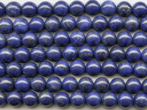 For twinkling touches of beauty in your designs, try the lapis lazuli 10mm round beads from Dakota Stones. Available by the strand, these bold beads are spherical in shape and feature glittering golden color sprinkled over a dark blue background. Lapis lazuli is a semi-precious stone that contains primarily lazurite, calcite and pyrite. It was among the first gemstones to be worn as jewelry. Showcase these stunning gemstone beads in a necklace design. Metaphysical Properties: Lapis lazuli is said to enhance insight, intellect and awareness.Because gemstones are natural materials, appearances may vary from bead to bead. Each strand includes approximately 20 beads.