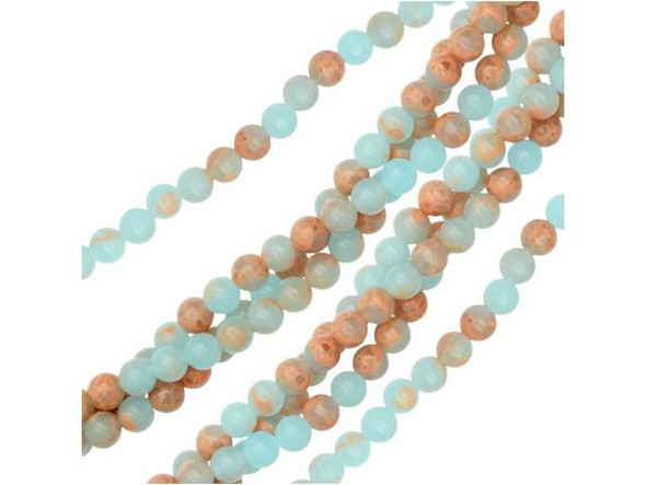 Soothing colors create a lovely display in these gemstone beads. These powder blue impression jasper beads from Dakota Stones feature a classic round shape that will work anywhere. They display a soft sky blue color interspersed with hints of peachy color. These beads will bring a dreamy, airy look to your designs. They are small in size, so you can use them as spacers or as pops of color in earring designs. Metaphysical properties: Jasper is said to be a stone of tranquility that will soothe nerves and banish negative thoughts.Because gemstones are natural materials, appearances may vary from piece to piece. Each strand includes approximately 52 beads.