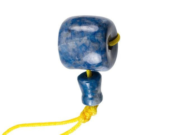 You can create jewelry full of meaning with the Dakota Stones denim lapis lazuli 12mm guru bead. This rounded bead features a unique design with three stringing holes. Bring each end of your stringing material through the holes on the sides of the bead and then bring both ends down through the stringing hole at the bottom of the bead. The smaller tower bead holds both ends together once they are strung through. This bead is added to designs after the rest of your beads are strung, so you don't have to worry about adding a clasp. Guru beads are traditionally used in mala jewelry. Malas are used with a prayer, or mantra, to meditate. Almost all malas feature a guru bead at the center of the design. It signifies the end of one round in the prayer circle. On a full-sized mala with 108 beads, the guru bead is the 109th bead. This gemstone guru bead features a mottled dark blue color with hints of grey and white. Metaphysical Properties: Lapis lazuli is said to enhance insight, intellect and awareness.Because gemstones are natural materials, appearances may vary from piece to piece.Length 10mm, Width 18mm