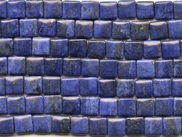 Like deep blue water swirling around with sand, the lapis lazuli 12mm square beads from Dakota Stones are full of beautiful, shimmering patterns. These slightly puffed square-shaped beads feature deep blue color flecked with golden sparkles. Lapis lazuli is a semi-precious stone that contains primarily lazurite, calcite and pyrite. It was among the first gemstones to be worn as jewelry and worked on. Metaphysical Properties: Lapis lazuli is said to enhance insight, intellect and awareness.Because gemstones are natural materials, appearances may vary from bead to bead. Each strand includes approximately 16 beads.