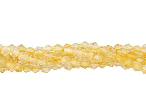 Create glittering gemstone accents in your jewelry designs with these Dakota Stones beads. These tiny beads take on a classic bicone shape with beautiful facets that shine from every angle. You'll love the way they catch the eye in your projects. Use these small beauties as spacers between bigger beads or alongside seed beads. They feature a buttery golden-yellow color. Because gemstones are natural materials, appearances may vary from piece to piece. Each strand includes approximately 135 beads.