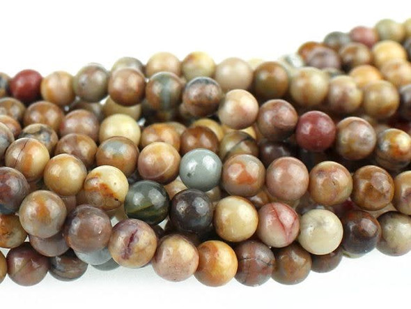 Bring earthy style to designs with the Dakota Stones 4mm Venus Jasper round beads. These beads are perfectly round in shape, so you can use them with any style. They are small in size, so they make excellent spacers. Try them as pops of color in your earring designs. These gemstone beads feature warm, earthy tones like beige, peach, brown and gray. They are sure to add soothing style to your designs. Venus Jasper takes its name from the planet Venus, which was named for the Roman goddess of love and beauty. It is also referred to as orbicular rhyolite. Metaphysical Properties: Jasper is a stone used from grounding, stability, strength and healing.Because gemstones are natural materials, appearances may vary from piece to piece. Each strand includes approximately 52 beads.