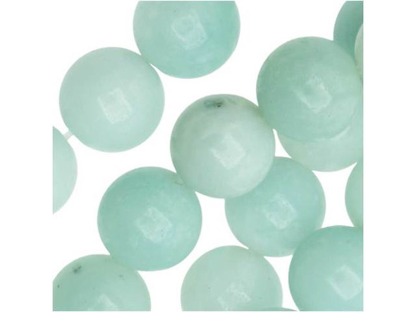 Tropical beauty fills the Dakota Stones Amazonite 8mm round beads. These beads feature a classic round shape. They are great for using in matching jewelry sets. Showcase them in necklaces and bracelets. Each bead features opaque ocean colors that range from blue-green to green. Amazonite is also known as Amazon stone. Metaphysical Properties: Amazonite is said to balance energy, while promoting harmony and universal love. It is often called the stone of courage and the stone of truth, as it provides the ability to discover truths and integrity.Because gemstones are natural materials, appearances may vary from piece to piece. Each strand includes approximately 24 beads.