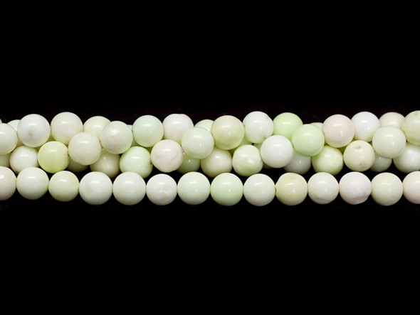 Bring the beauty of gemstones to your designs with these 6mm round beads from Dakota Stones. These beads feature a classic round shape. Chrysoprase is a bright apple green, translucent stone, whose color often caused ancient jewelers to confuse it with Emerald. A cryptocrystalline Chalcedony, its brilliant color comes from the presence of very small inclusions of Nickel compounds. Chrysoprase is believed to balance the heart chakra and help one understand their needs and emotions. Because gemstones are natural materials, appearances may vary from bead to bead.