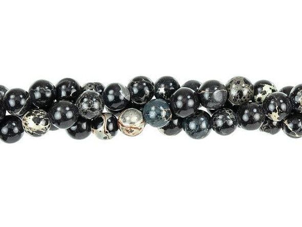 Put bold accents into your style with these Dakota Stones impression jasper beads. These gemstone beads are perfectly round in shape, so they will work in a variety of designs. They are small in size, so you can use them as spacers between larger beads or just as small accents of color. Impression jasper comes in a variety of colors. These beads have been dyed a black color, which creates a striking contrast with the tan and crimson matrix colors. Metaphysical properties: Impression Jasper is used to find clarity and inner peace. Because gemstones are natural materials, appearances may vary from piece to piece. Each strand includes approximately 90 beads.