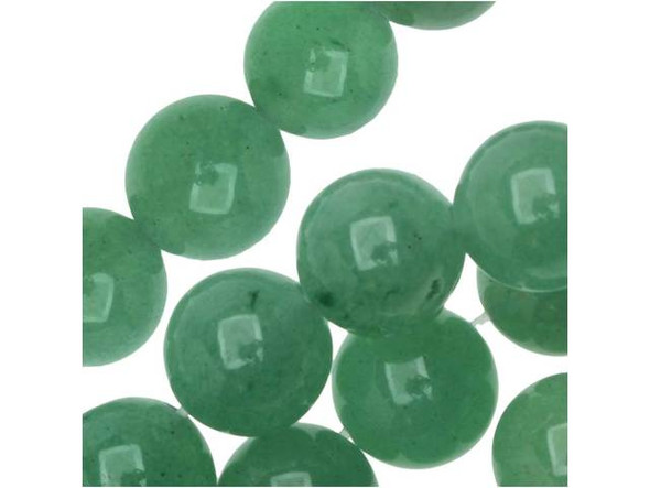 Go green in your style. These Dakota Stones green aventurine beads are full of green color. They are perfectly round, so they lend themselves well to classic styles. Try them in matching necklace and bracelet sets. Aventurine is a form of quartz and most commonly displays a green color. Metaphysical properties: Green aventurine is believed to be a lucky stone, promoting wealth and prosperity.Because gemstones are natural materials, appearances may vary from bead to bead. Each strand includes approximately 24 beads. 