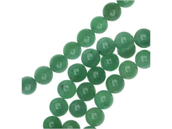 Go green in your style. These Dakota Stones green aventurine beads are full of green color. They are perfectly round, so they lend themselves well to classic styles. Try them in matching necklace and bracelet sets. Aventurine is a form of quartz and most commonly displays a green color. Metaphysical properties: Green aventurine is believed to be a lucky stone, promoting wealth and prosperity.Because gemstones are natural materials, appearances may vary from bead to bead. Each strand includes approximately 24 beads. 