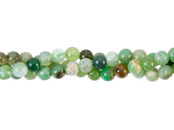 Cheerful colors fill the Dakota Stones 5mm chrysoprase round beads. These beads feature a perfectly round shape, so they will work in all kinds of designs. They are versatile in size, so you can use them in necklaces, bracelets and even earrings. Chrysoprase is a gemstone variety of chalcedony and contains small quantities of nickel. These beads feature varying shades of green, from mint to moss, along with hints of brown and gray. Metaphysical Properties: Chrysoprase is said to be a stone that encourages hope and joy.Because gemstones are natural materials, appearances may vary from piece to piece.