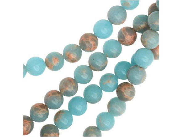 You'll love bringing soothing style to designs with these gemstone beads. These powder blue impression jasper beads from Dakota Stones feature a classic round shape that will work anywhere. They display a soft sky blue color interspersed with hints of peachy color. These beads will bring a dreamy, airy look to your designs. They are the perfect size for matching necklace and bracelet sets. Metaphysical properties: Jasper is said to be a stone of tranquility that will soothe nerves and banish negative thoughts.Because gemstones are natural materials, appearances may vary from piece to piece. Each strand includes approximately 24 beads.