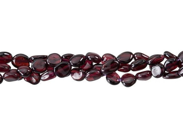 Daring style can be yours with these red garnet beads. These beads from Dakota Stones feature dark red color full of dramatic beauty. You can pair them with black for a truly bold look. They have a rounded pebble shape, perfect for organic styles. Metaphysical Properties: Garnet is said to be a stone that utilizes creative energy.Because gemstones are natural materials, appearances may vary from bead to bead. Each strand includes approximately 62-92 beads.Length 6.5-8mm, Width 4-6mm