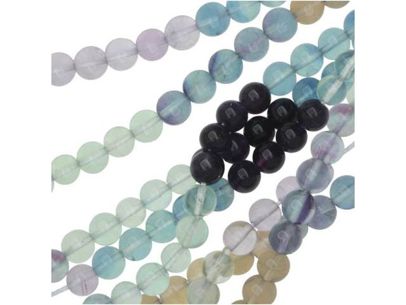 Dress up designs with the colorful style of the Dakota Stones banded fluorite 6mm round beads. These spherical beads feature a versatile size you can use in earrings, necklaces and bracelets. These beads feature purple, green, pink and blue colors. Often, more than one color occurs in a single stone. Fluorite is a colorful mineral, both in visible and ultraviolet light. The stone has ornamental, lapidary and industrial uses. Metaphysical Properties: Known as the "Genius Stone," fluorite clears the mind of illusion and enhances concentration.Because gemstones are natural materials, appearances may vary from piece to piece. Each strand includes approximately 34 beads.