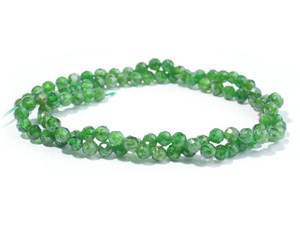 Create glittering gemstone accents in your jewelry designs with these Dakota Stones beads. These beads take on a classic round shape with beautiful facets that shine from every angle. You'll love the way they catch the eye in your projects. They feature a vibrant green color. Diopside is a calcium and magnesium silicate mineral. It is transparent or translucent, and can display a nearly emerald green color due to the presence of Chromium within the stone. It is believed to increase one’s metaphysical connection with the earth.Because gemstones are natural materials, appearances may vary from piece to piece.