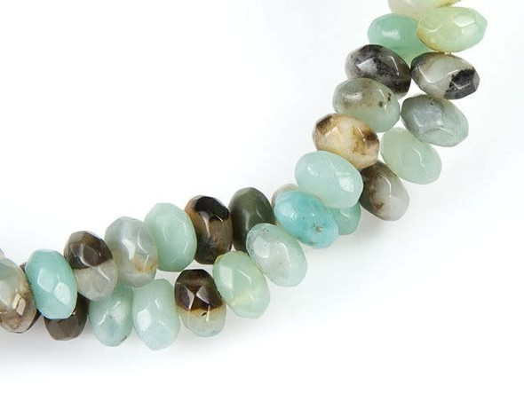 Make a style statement with the Dakota Stones 8mm black-gold Amazonite faceted roundel beads. Available by the strand, these beads feature a classic rounded shape with diamond-shaped facets decorating the surface. They are great for use as spacers between larger beads. They feature beachy colors like mint green, turquoise blue and sandy brown. Black gold Amazonite contains Amazonite, Tourmaline and pyrite all in one light blue and black stone. Metaphysical Properties: Black gold Amazonite is often used to become a better communicator. It is also said to stop fearful feelings during confrontation or when reflecting on painful memories.Because gemstones are natural materials, appearances may vary from piece to piece. Each strand includes approximately 24 beads.