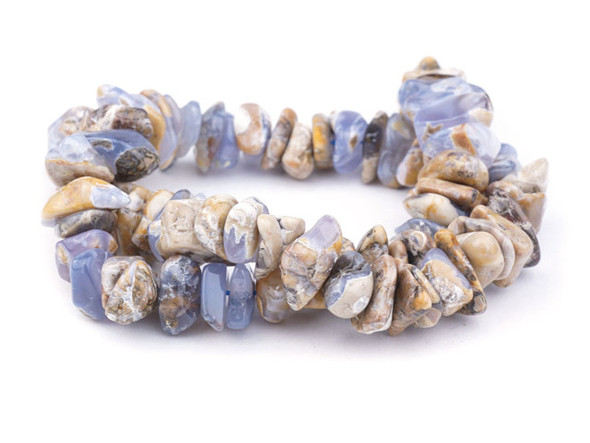 Marbled style fills these chalcedony beads from Dakota Stones. The mix of light tan and brown colors with translucent blues makes these beads really stand out. These beads feature irregular chip shapes, perfect for organic styles. Layer them into necklaces, bracelets, and even earrings. Blue chalcedony is a naturally occurring, soft blue translucent stone. It is a member of the quartz family, a form of silica with a cryptocrystalline structure that incorporates moganite along with the quartz. This marbled blue chalcedony is created from chalcedony and the material that it forms next to, creating a marbled form. Because gemstones are natural materials, appearances may vary from piece to piece.