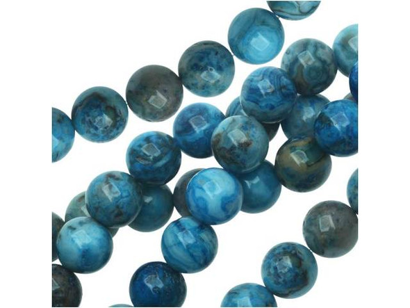 Give your designs Southwestern flair by adding natural elements with the blue crazy lace agate 10mm round beads from Dakota Stones. These round beads feature bright blue color swirled with white and the occasional hint of green. Pair with copper components to enhance the vibrant blue color. They have a Mohs hardness of 6.5-7. Mexican crazy lace agate is normally an opaque white gemstone with swirling patterns, but these beads are color enhanced to emphasize these beautiful patterns. Color enhancing is common amongst agates to make them fashionably relevant. Metaphysical Properties: Often called the happy stone, crazy lace agate promotes laughter and optimism. Because gemstones are natural materials, appearances may vary from bead to bead. Each strand includes approximately 20 beads.