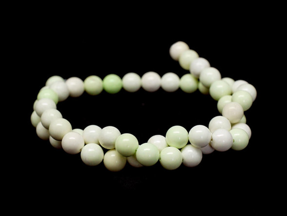 Bring the beauty of gemstones to your designs with these 8mm round beads from Dakota Stones. These beads feature a classic round shape. Chrysoprase is a bright apple green, translucent stone, whose color often caused ancient jewelers to confuse it with Emerald. A cryptocrystalline Chalcedony, its brilliant color comes from the presence of very small inclusions of Nickel compounds. Chrysoprase is believed to balance the heart chakra and help one understand their needs and emotions. Because gemstones are natural materials, appearances may vary from bead to bead.