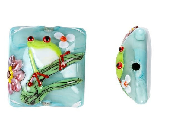 Hop into great style with this Grace Lampwork bead. This bead features a square shape. The front is decorated with a bright green tree frog staring up with red eyes. The frog sits on a green branch surrounded by sweet pink and white flowers on a soft blue background. The front of this bead is slightly domed so it will stand out even more. The back is flat and plain. String this bead onto a head pin for a quick pendant or try it at the center of bead embroidery. It will add cheerful beauty anywhere.This item is handmade, so appearances may vary.26.7 x 26.7mm