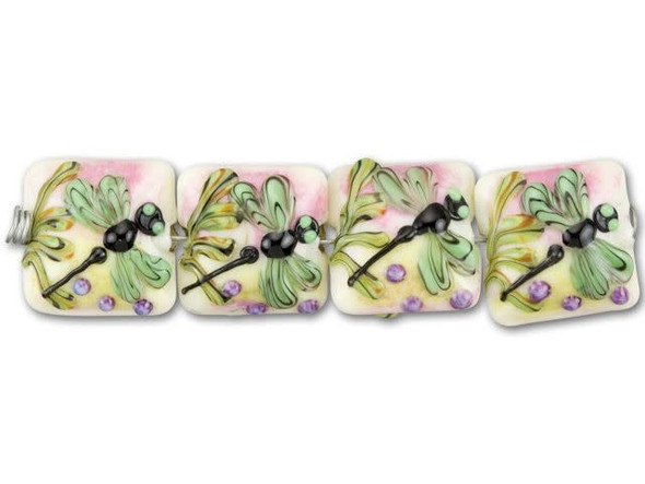 Fresh style fills this Grace Lampwork bead. This glass bead is shaped like a puffed square and features a black dragonfly with green wings flying against a background of pink, green and white swirls and purple dots. These beads have a glossy shine and the dragonfly is raised from the surface of the bead to create a textured look with dimension.This item is handmade, so appearances may vary. Depth 9-9.5mm, Length 14.5-15mm, Width 15-15.5mm