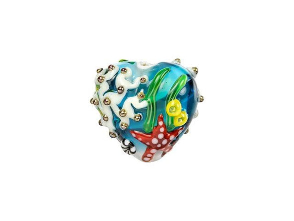 Transport yourself to an underwater paradise with the Grace Lampwork Under the Sea, Sea Star and Coral Heart Focal Bead. This stunning glass bead is bursting with bold colors, showcasing red starfish, vibrant coral, and sea urchins among the swaying seaweed. Its unique heart shape and puffed dimension make it a standout addition to your jewelry designs that's sure to catch the eye. Use it as the centerpiece of a necklace or bracelet or thread it onto a headpin to create a beautiful pendant. With this handmade treasure, every piece you create will be truly one-of-a-kind.