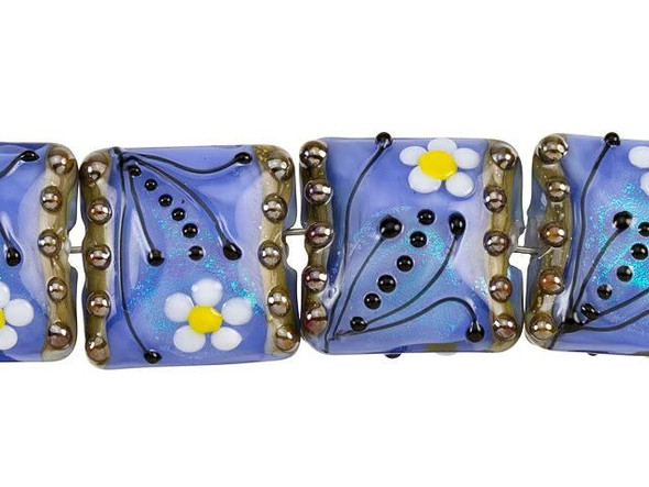 Sophisticated floral style fills these Grace Lampwork beads. These beads feature a square pillow shape with a subtle puffed dimension. The surface is decorated with a white and yellow daisy with black swirls and dots surrounding it. The inside of the glass shimmers with an elegant powder blue color that lights up with aqua glitter. Both sides of each bead are decorated, so they will look great from any angle. You can use these beads in matching jewelry sets for a fun display of style. This item is handmade, so appearances may vary. Dimensions: 15 x 15mm, Hole Size: 2.5mm