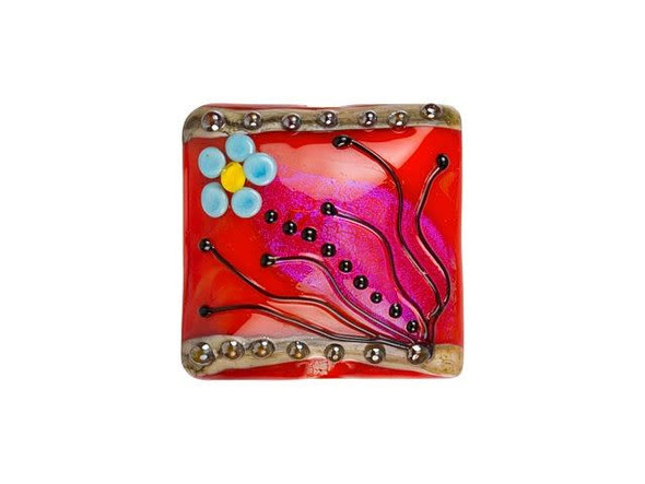 Liven up your style with this Grace Lampwork bead. This bead features a square shape with a domed front. The front is decorated with a turquoise and yellow daisy and black swirls and dots. The inside of the glass is red and shimmers with magical hints of hot pink. The back is flat and undecorated. String this bead onto a head pin for a quick pendant or try it at the center of bead embroidery. This item is handmade, so appearances may vary.Hole Size 2.6mm/10 gauge, Length 25mm, Width 26mm